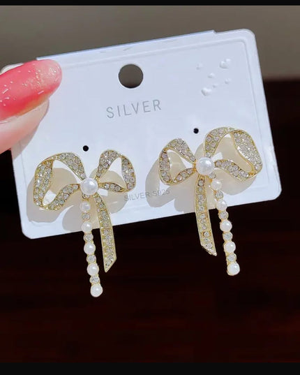 Bow shape pearl earrings