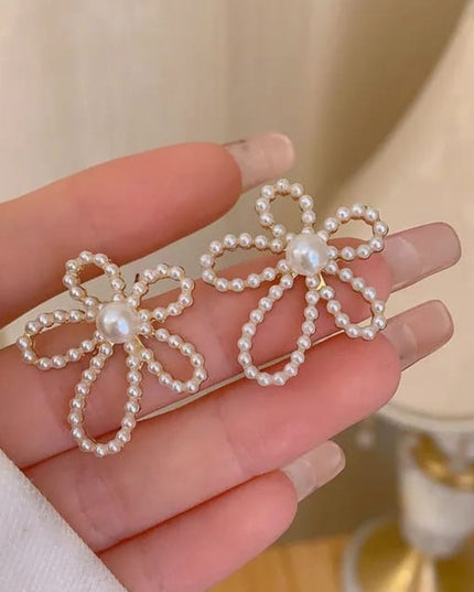 Daisey pearl flower earnings